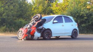 Head-On Collision between Motorcycle & Car 